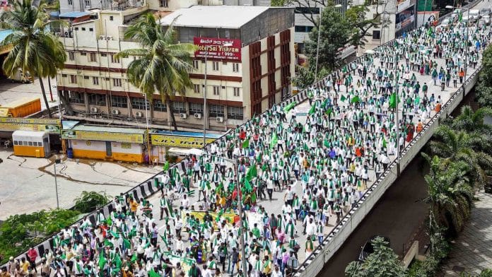 File photo | Karnataka State Farmers Association members take part in a protest rally | PTI
