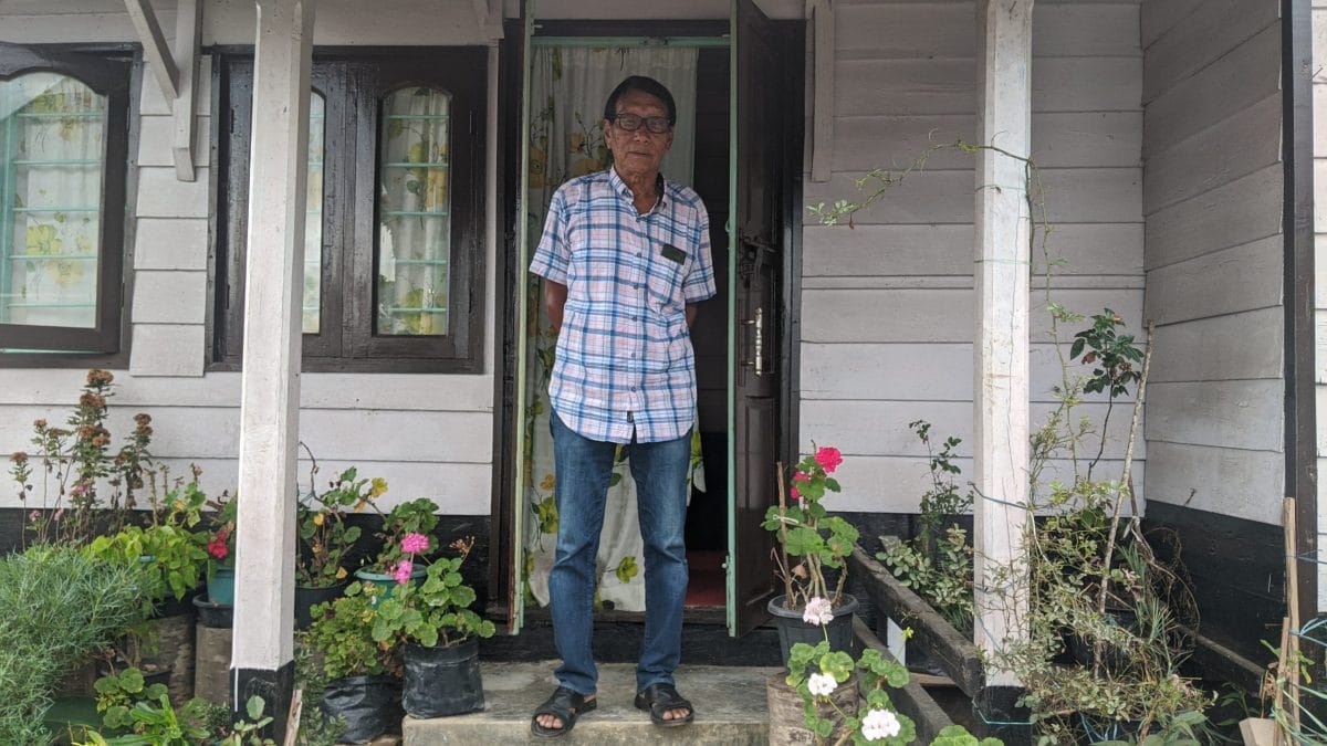79-year-old Vareisui Muivah, the youngest sibling of Th. Muivah’s, stands outside their childhood home in Somdal  | Yimkumla Longkumer | ThePrint