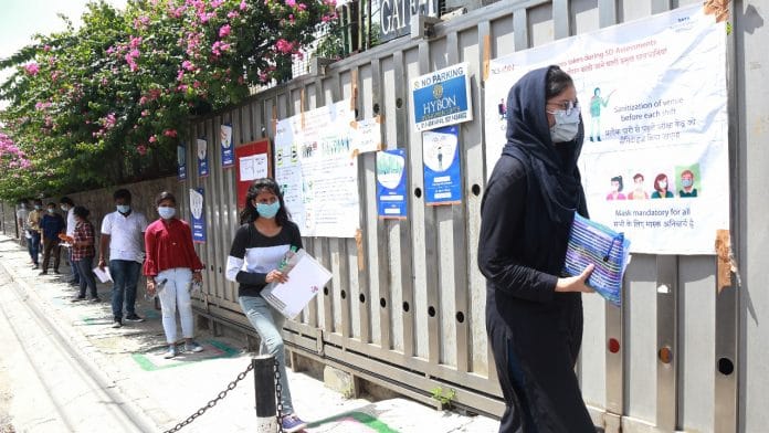Students appearing on the first day of this year’s Joint Entrance Exam (JEE) outside the Arwachin Bharti Bhawan Senior Secondary School centre in New Delhi's Vivek Vihar | Photo: Manisha Mondal | ThePrint
