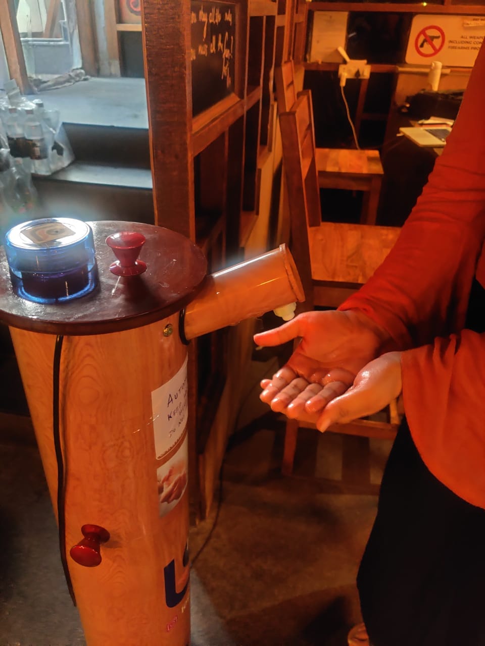 A hands-free sanitisation device at My Bar, CP | Bismee Taskin | ThePrint