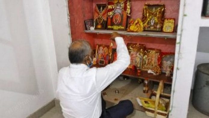 Judge S.K. yadav offering prayers before leaving for work | Photo: Praveen Jain | ThePrint