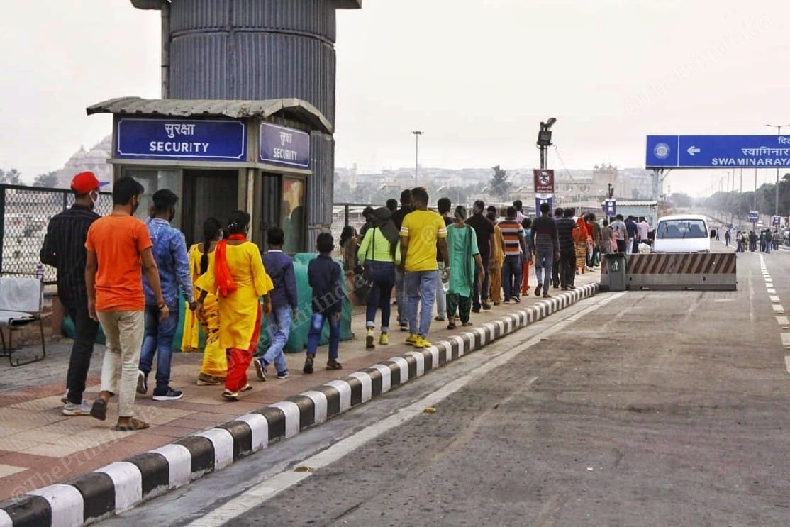 People stand in large queues | Photo: Praveen Jain | ThePrint