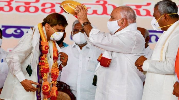 Karnataka CM B.S. Yediyurappa felicitates Dr C. Manjunath of Jayadeva Institute of Cardiovascular Sciences and Research, during the inauguration of the Mysuru Dasara Saturday | PTI