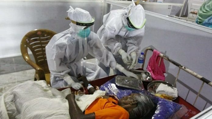 Representational image | Health workers checking on a patient at a second-line treatment centre for Covid-19, in Ernakulam | Photo: Praveen Jain | ThePrint