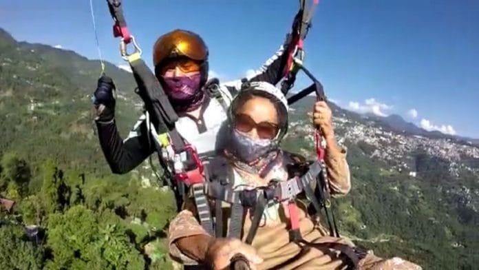 Dukmit Lepcha takes a photo while paragliding | By special arrangement 