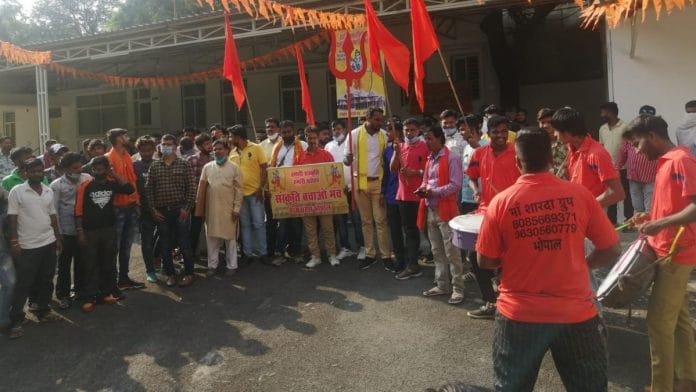 Members of a Right-wing outfit known as Sanskruti Bachao Manch celebrate after Madhya Pradesh government lifted restrictions on height of Durga idols, in Bhopal Sunday | By special arrangement