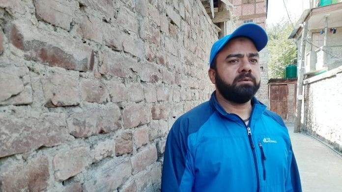 Mirza Nisar Hussain, now 40 years old, at his family's home in Srinagar | Photo: Azaan Javaid | ThePrint