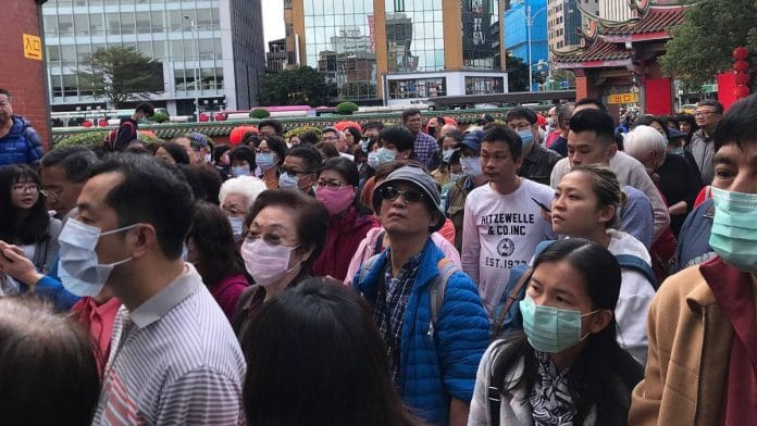 People outside the Xingtian Temple in Taipei, Taiwan (representational image) | Flickr