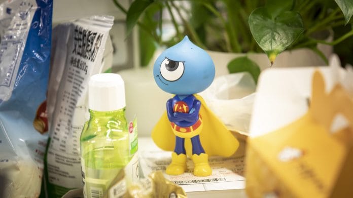 A toy figurine of the Ant Group Co. mascot sits on a desk at the company's headquarters in Hangzhou, China, on Monday, Sept. 28, 2020. Jack Ma's Ant Group is seeking to raise $17.5 billion in its Hong Kong share sale and won't seek to lock in cornerstone investors, confident there will be plenty of demand for one of the largest equity deals in the financial hub, according to people familiar with the matter. Photographer: Qilai Shen/Bloomberg