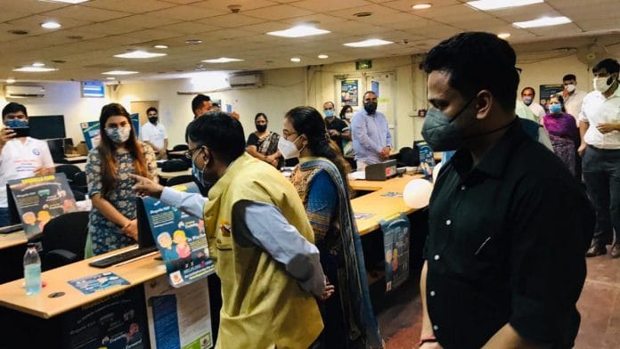 Additional chief secretary, Delhi, Satya Gopal (centre) during the launch of the helpline number | Twitter | @DRNITINSHAKYA