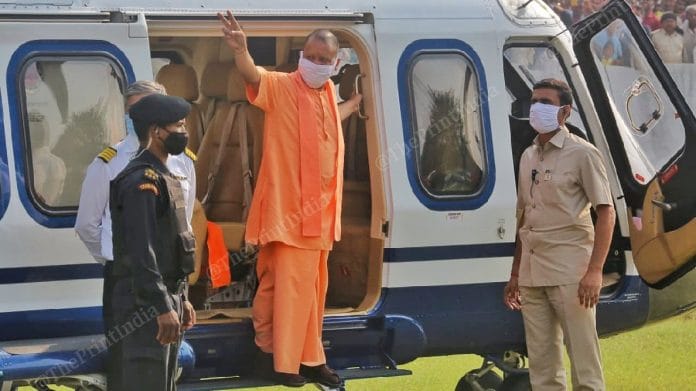 Chief Minister of Uttar Pradesh Yogi Adityanath waving crowd before addressing the public | Praveen Jain | ThePrint