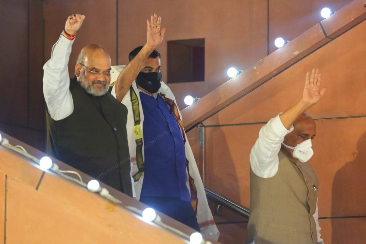 Union cabinet ministers Amit Shah left), Nitin Gadkari middle), and Rajnath Singh right) addressing the crowd at the felicitation ceremony | Photo: Praveen Jain | ThePrint