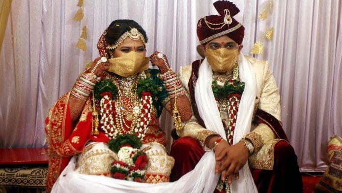 File image of a couple getting married during the pandemic | Representational image | ANI
