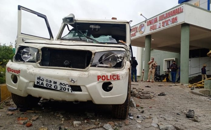 A mob protesting against a social media post torched DJ Halli and KG Halli police stations in Bengaluru in August | Photo: Rohini Swamy/ThePrint