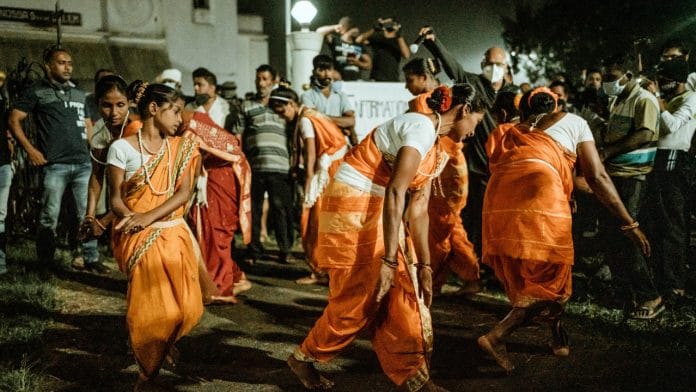 Locals in Chandol village, Western Ghats protesting and performing Kunbi (a local folk dance) near the railway line which the government has proposed to work on | Twitter: @savemollemgoa