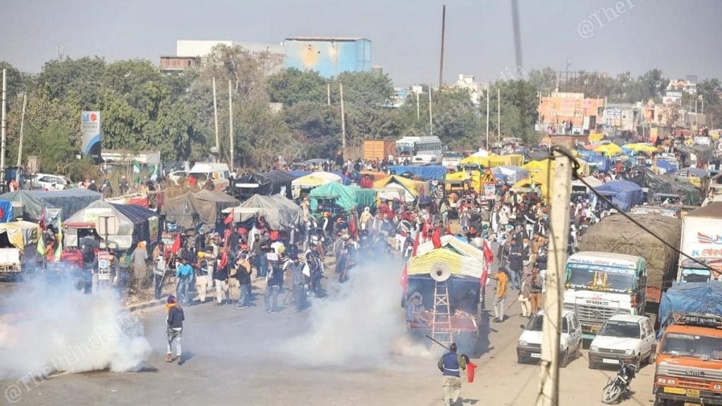 Tear gas shells are fired at protestors at the Singhu Border in North Delhi | Photo: Manisha Mondal | ThePrint