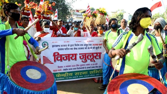 Tribal people celebrate the Jharkhand assembly's resolution to let them identify their religion as 'Sarna' in Ranchi on 11 November | Photo: ANI