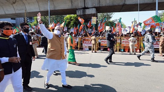 Union Home Minister Amit Shah waves his supporters as he arrived in Chennai Saturday. | Photo: ANI