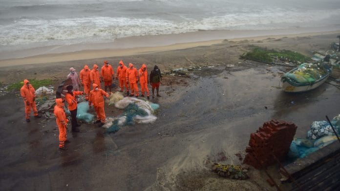 NDRF personnel inspect an area of Devanerikuppam near Mamallapuram before the landfall of Cyclone Nivar, in Mamallapuram, Wednesday, Nov. 25, 2020. | PTI
