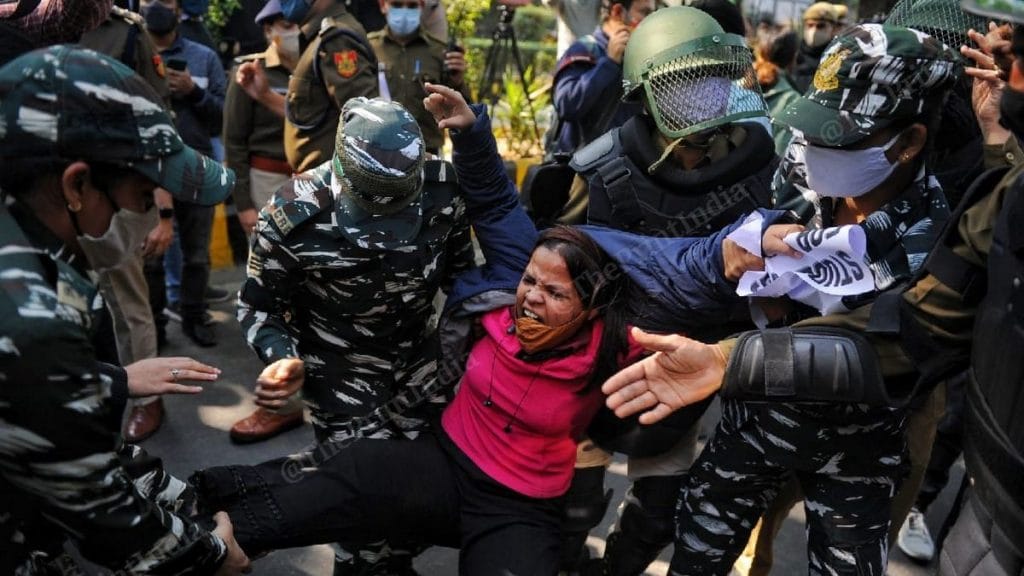 A protestor is carried by security personnel at Jantar Manter in New Delhi Thursday | Photo: Suraj Singh Bisht | ThePrint