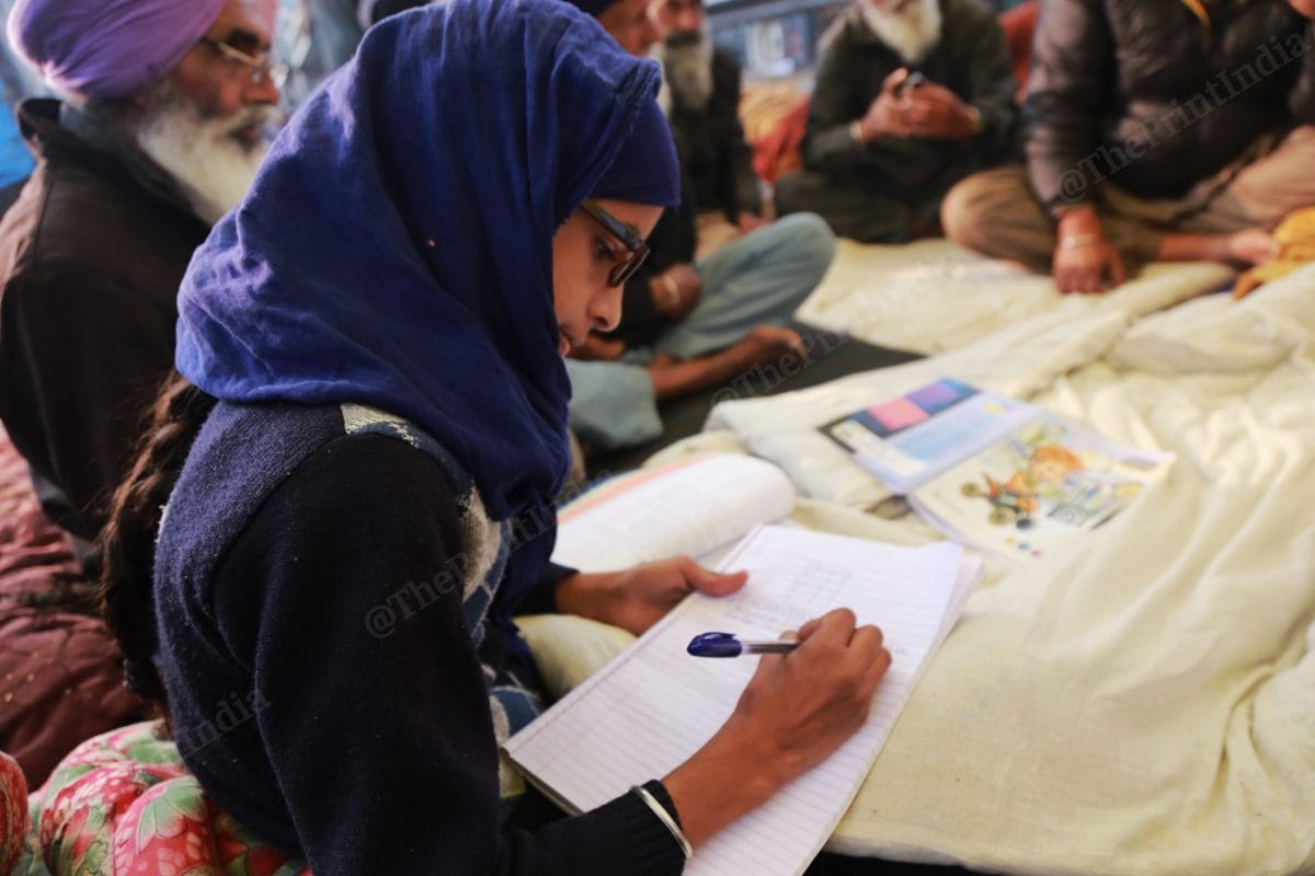 Kaur sits inside a makeshift tent | Photo: Manisha Mondal | ThePrint