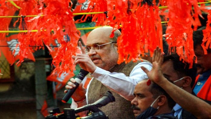 Union Home Minister Amit Shah at his roadshow in Bolpur, Birbhum, Sunday | PTI