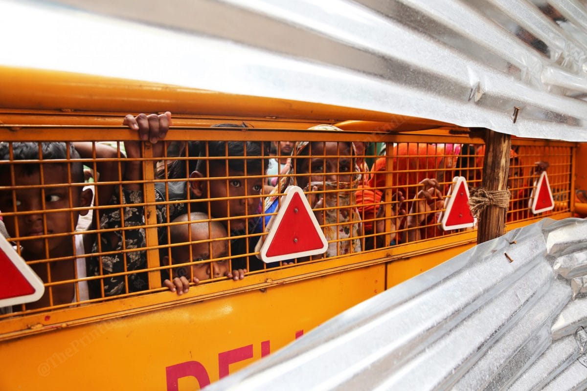 In Delhi's Jahangirpuri, people inside a containment zone seek help from the other side of the Delhi Police barricades | Photo: Manisha Mondal | ThePrint
