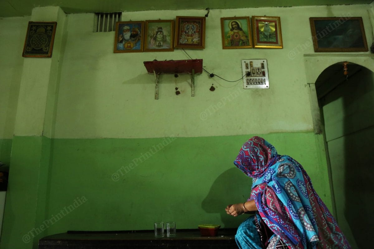 A sex worker does her household chores. Most days are spent managing the home and worrying about the future during the lockdown months | Manisha Mondal | ThePrint