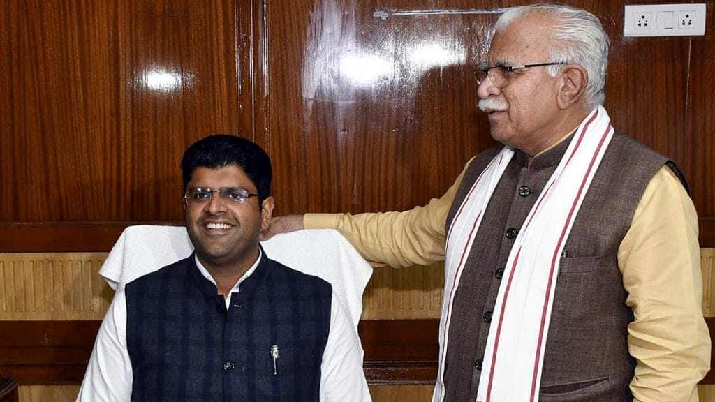File image of Haryana Deputy CM Dushyant Chautala (seated) of the JJP with ally BJP's CM Manohar Lal Khattar | Photo: ANI