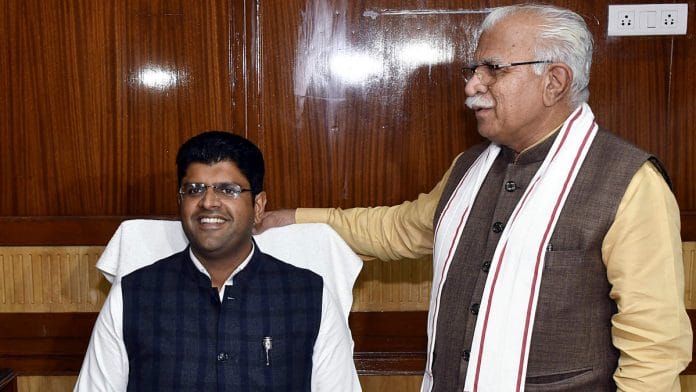 File image of Haryana Deputy CM Dushyant Chautala (seated) of the JJP with ally BJP's CM Manohar Lal Khattar | Photo: ANI