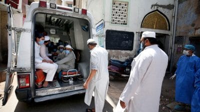 File photo of medical workers in Ahmedabad taking people who had attended the Tablighi Jamaat event in New Delhi to a quarantine facility