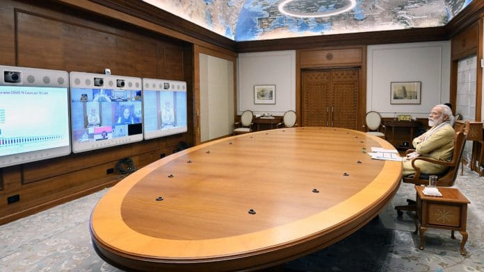 File photo | Prime Minister Narendra Modi chairing a meeting to review Covid, July 2020 | PIB