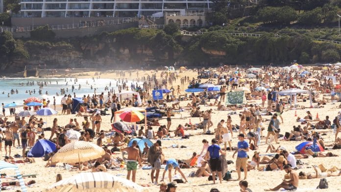 Crowds at Bondi Beach on 27 December 27 in Sydney, Australia | Photo Mark Evans