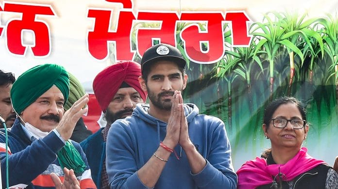 Boxer Vijender Singh at the farmers' protest site at Singhu border, New Delhi on 6 December