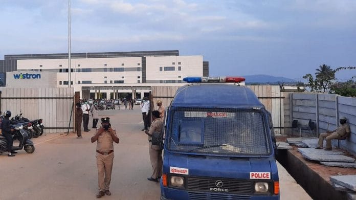 A police vehicle stands outside the Wistron factory in Narasapura, Kolar | Photo: Rohini Swamy | ThePrint