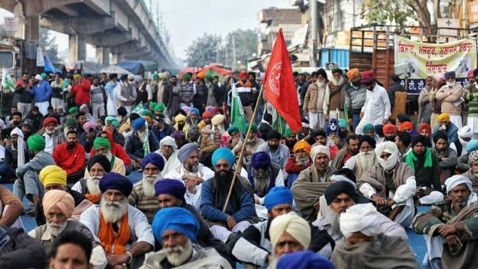 Farmers protesting at Tikri border against the three farm laws | Photo: Suraj Singh Bisht | ThePrint
