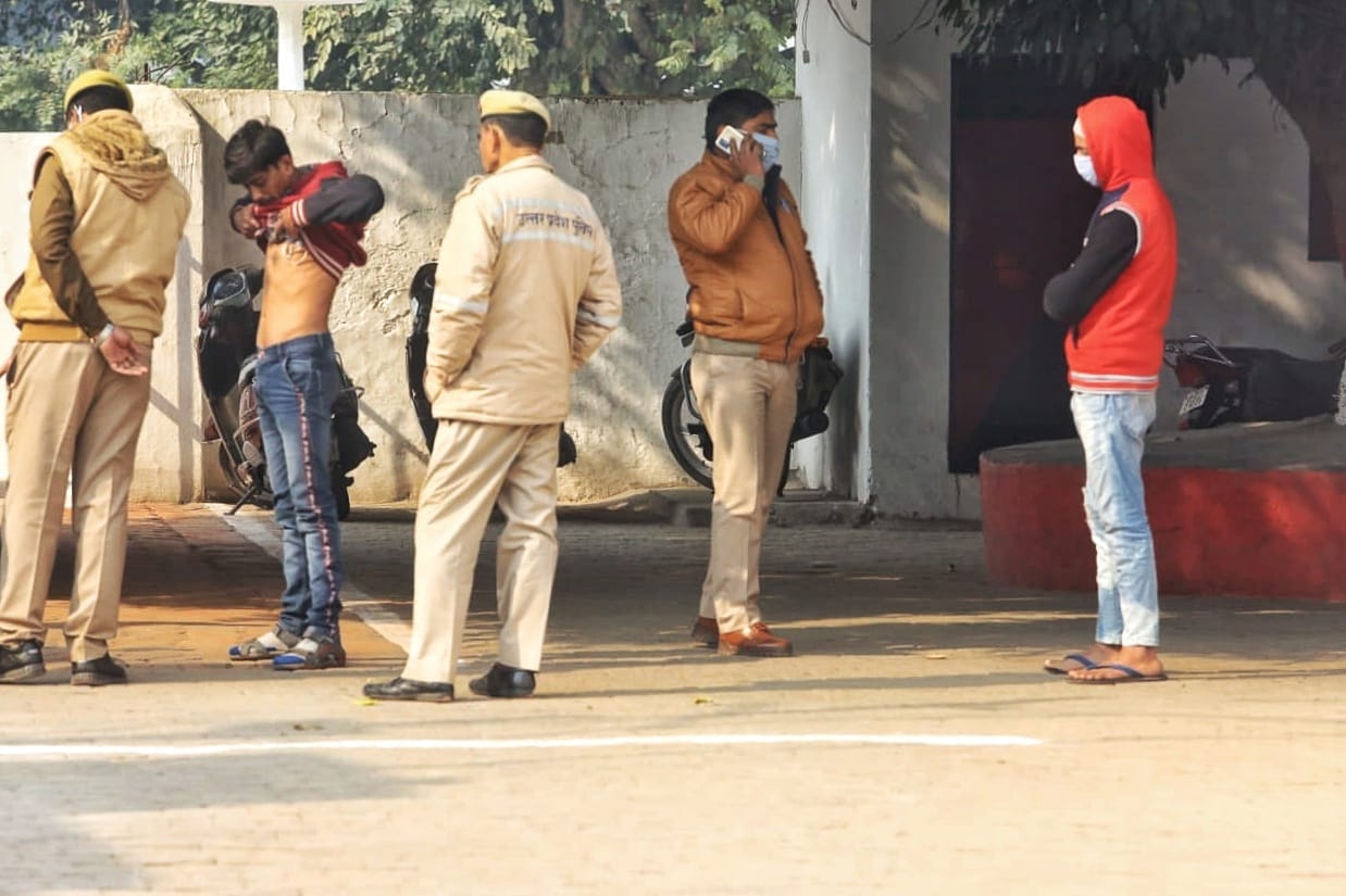 Rashid (right) and his brother, Saleem, on the jail premises in Moradabad | Rashid arrested on 5 December. He was released on 19 December 2020 | Rashid put his hand on Pinky's forehead | Praveen Jain | ThePrint