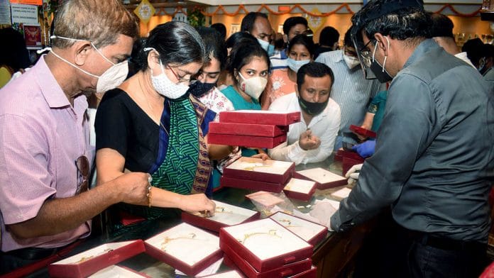 Representational image of people purchasing gold jewellery | File photo: ANI