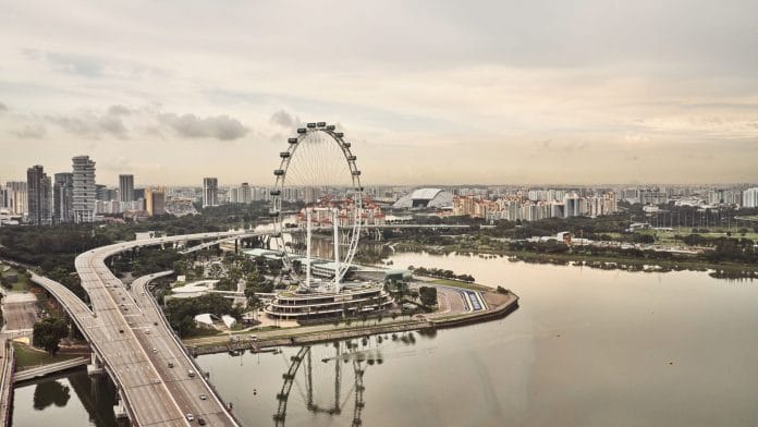 The Singapore Flyer, center, in Singapore, on Tuesday, Nov. 3, 2020. | Photographer: Lauryn Ishak | Bloomberg