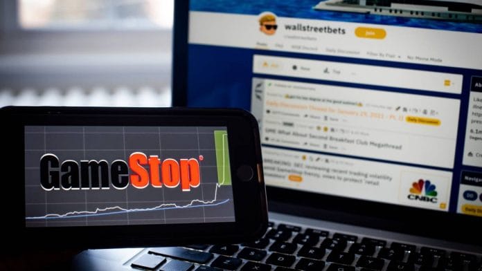 The WallStreetBets forum on Reddit website and the GameStop Corp. logo | Tiffany Hagler-Geard | Bloomberg