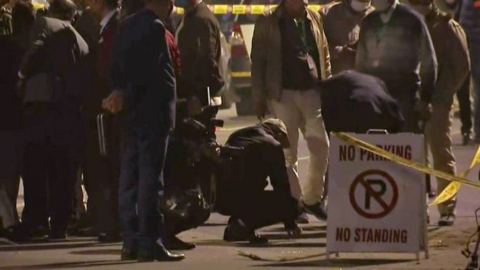 Security personnel inspect the site where a low-intensity explosion occurred near the Israel Embassy in New Delhi on 29 January 2021 | ANI