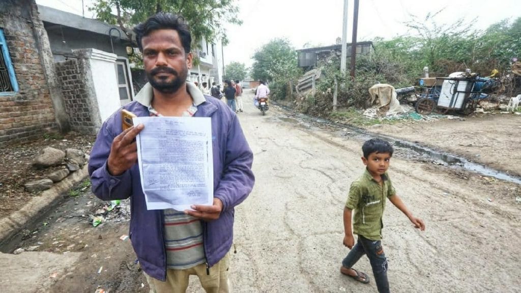 Dorana resident Mohammed Umer Mansoori displays a letter he has written to the Mandsaur SP | Photo: Praveen Jain | ThePrint