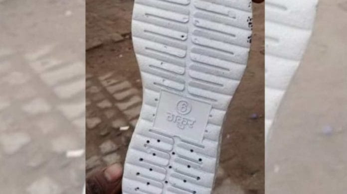 One of the shoes, sold by Nasir, with 'Thakur' written on it | By special arrangement