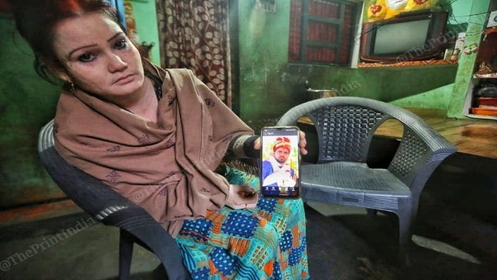 Priya Verma, 29, shows a photo of her husband Taufiq from their wedding day | Praveen Jain | ThePrint