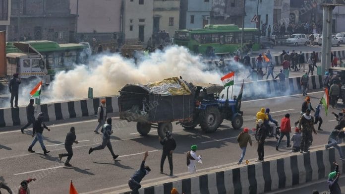 Protesting farmers clashed with police at several places in the national capital after tractor rally turned violent, on 26 January 2021 | Photo: Suraj Bisht Singh | ThePrint