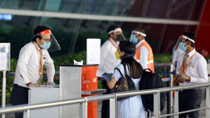 Representational image | A woman traveller outside the gates of the IGI airport in Delhi | Suraj Bisht | ThePrint