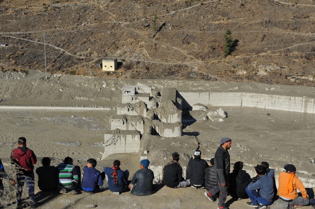 Locals overlook the Joshimath dam | Photo: Suraj Singh Bisht | ThePrint