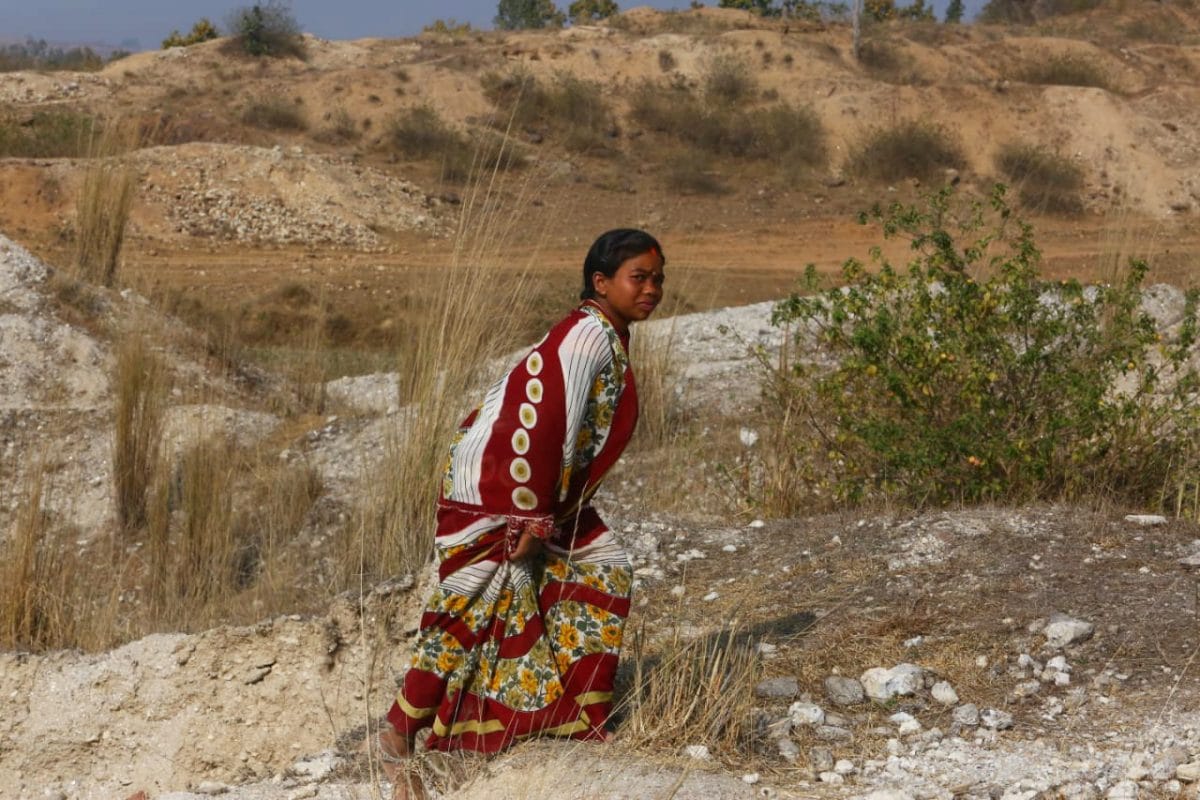 Vasanti, 21, walks across dug up caves, in search of mica | Photo: Praveen Jain | ThePrint