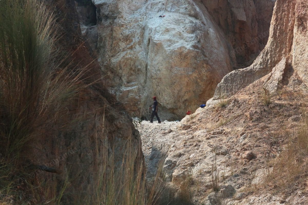 A man walks across an abandoned mica mine in Bergiyatari, Giridih | Photo: Praveen Jain | ThePrint
