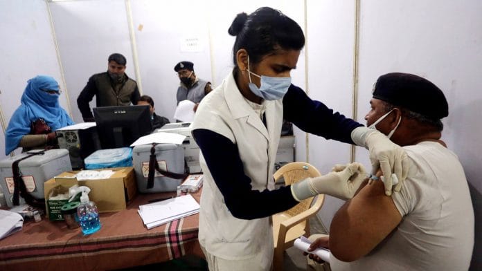 A policeman is vaccinated in Madhya Pradesh | Representational image: ANI